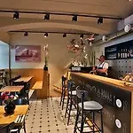 & Aparthotel