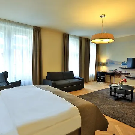 & Aparthotel