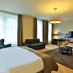 & Aparthotel