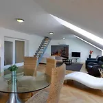& Aparthotel
