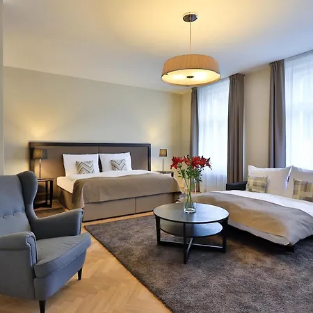 & Aparthotel